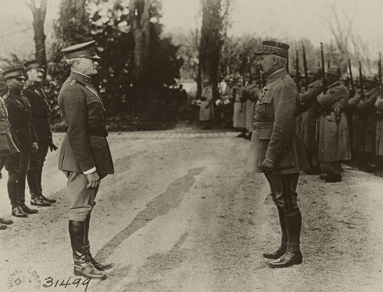 grayscale photo of 2 men in military uniform